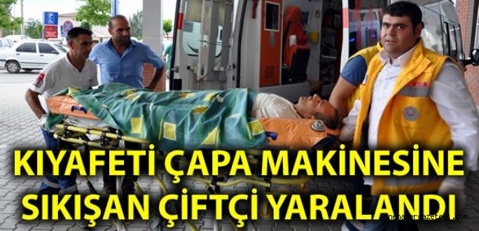 Kıyafeti çapa makinesine sıkışan çiftçi yaralandı